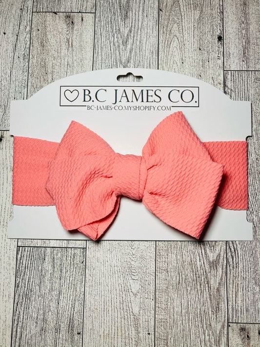 B.C JAMES CO. Coral Colored bullet material bow headband, Baby girl headbands