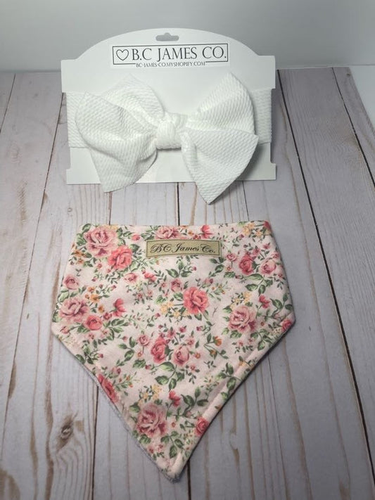 B.C JAMES CO. Floral bib with a white bow headband